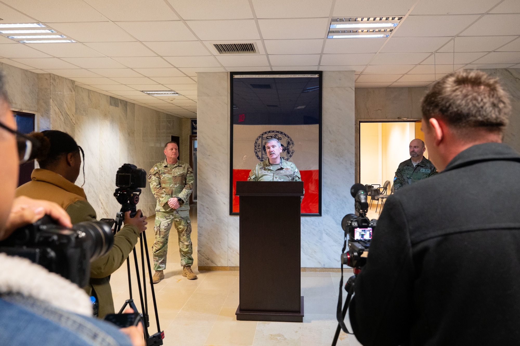 39th ABW commander Col. Mike Esposito, 39th Air Base Wing commander, speaks to simulated media at a press conference