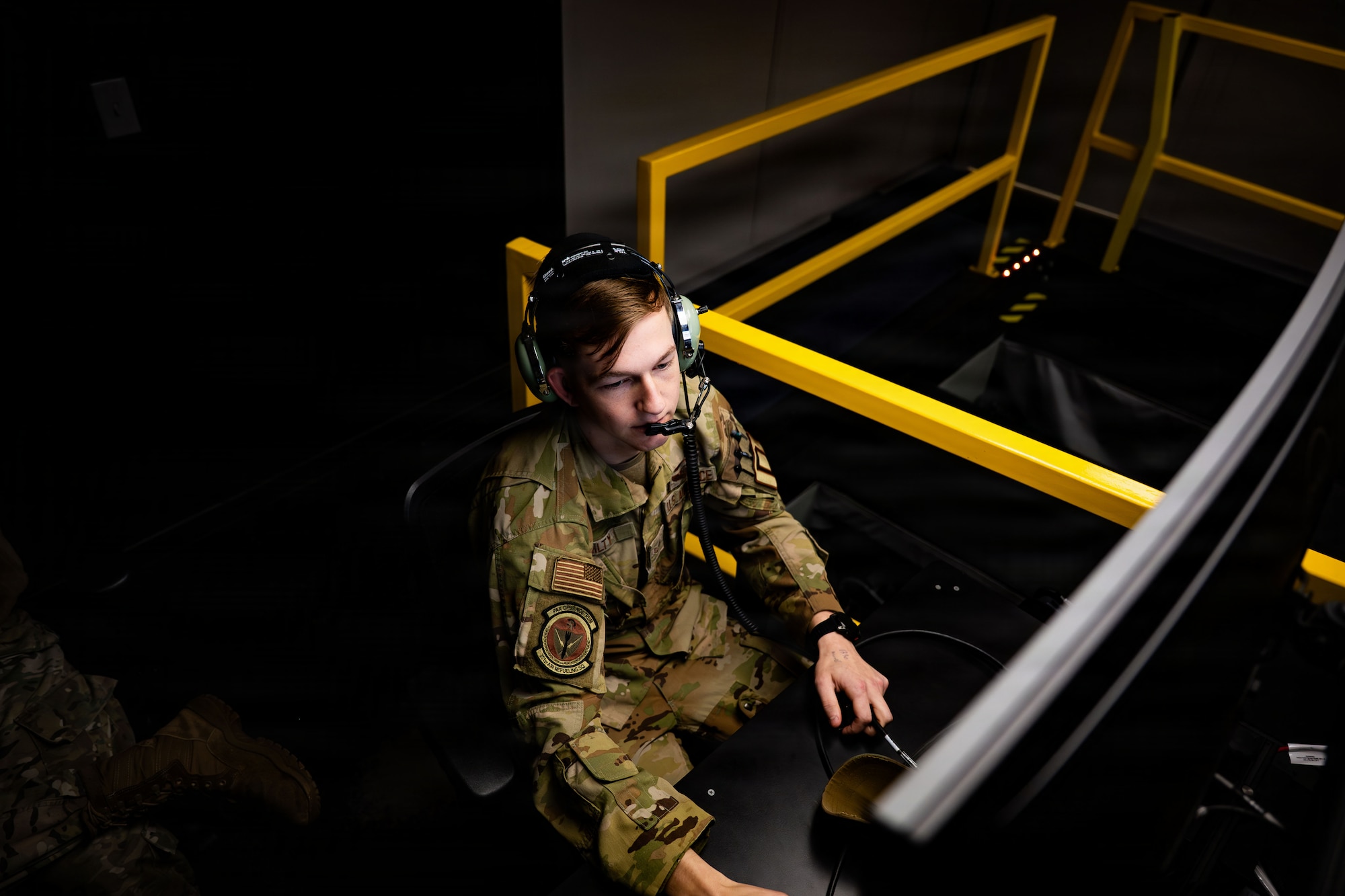 After initial training, boom operators continue simulator and live-flight training throughout their careers.