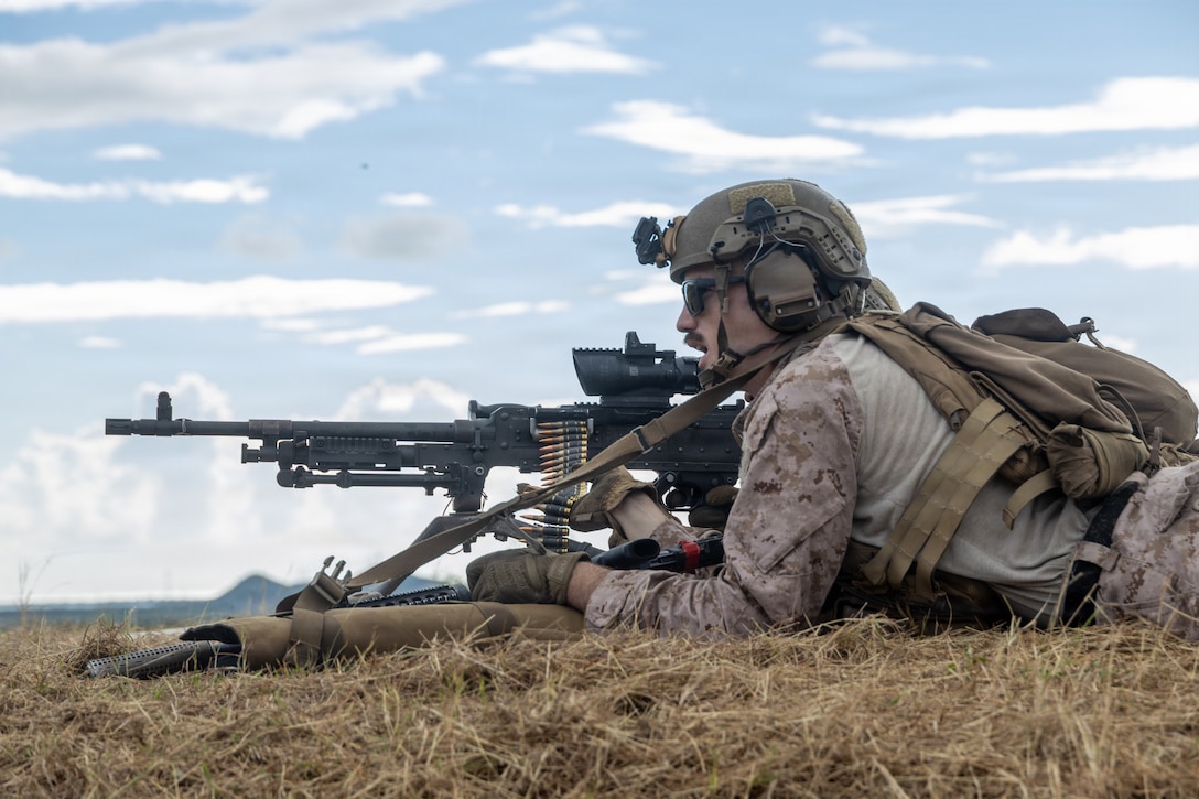 U.S. Marines with India Company, Battalion Landing Team 3/6, 22nd Marine Expeditionary Unit (Special Operations Capable), fire a M240B machine gun during a live-fire range at Camp Santiago, Puerto Rico, Dec. 23, 2025. U.S. military forces are deployed to the Caribbean in support of the U.S. Southern Command mission, Department of War-directed operations, and the president’s priorities to disrupt illicit drug trafficking and protect the homeland. (U.S. Marine Corps photo)