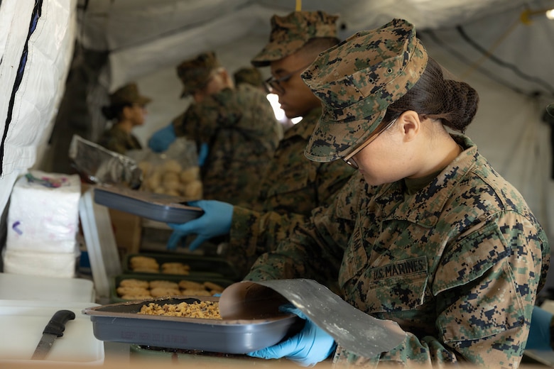 U.S. Marine Corps Lance Cpl. Amy Tran prepares a pastry for a food service competition at Marine Wing Support Squadron (MWSS) 472, Wyoming, Pennsylvania, Jan. 11, 2026. Tran is a food service specialist with MWSS 472, Marine Aircraft Group 49, 4th Marine Aircraft Wing. Marines participated in an inspection for the Maj. Gen. William Pendleton Thompson Hill Awards to demonstrate their quality of food preparation, sanitation, and customer service. (U.S. Marine Corps photo by Lance Cpl. Priscilla Flores)