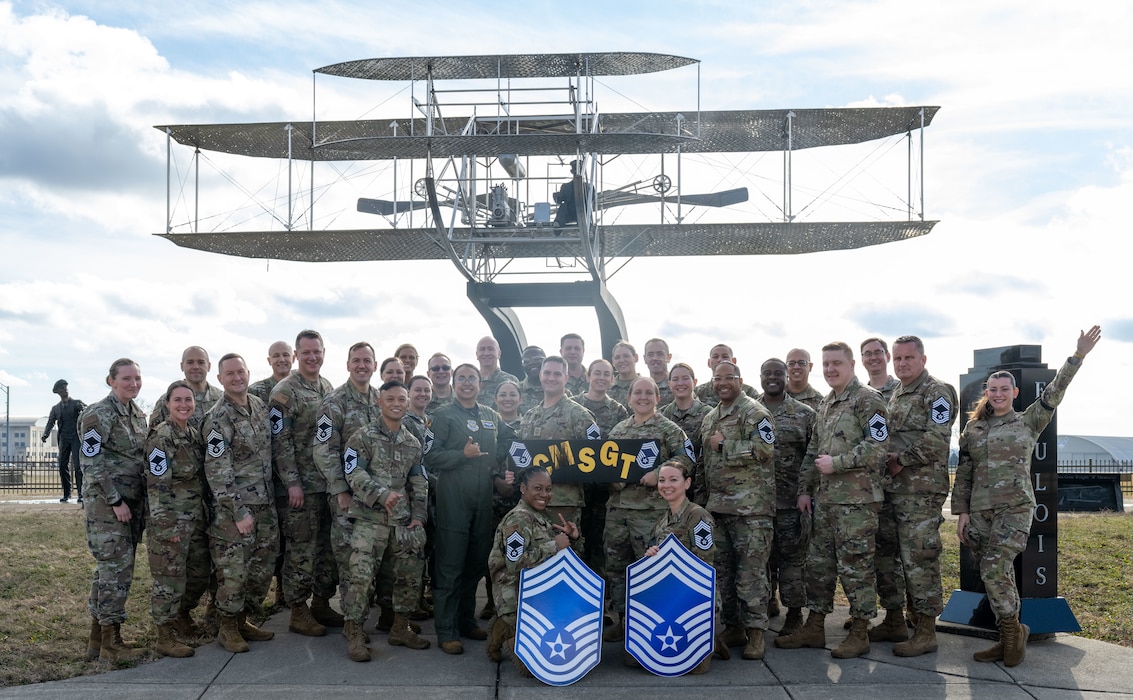 Newly selected Chief Master Sergeants join current CMSgt members to celebrate their promotion to the highest rank in the Air Force with a group photo on January 9, 2026, at the Wright-Patterson Air Force Base Club. Air Force officials selected 640 senior master sergeants for promotion to chief master sergeant out of 2,445 eligible candidates, resulting in a selection rate of 26.18 percent in the 25E9 promotion cycle. (U.S. Air Force photo by Jack Gardner)