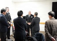 JOINT BASE SAN ANTONIO-FORT SAM HOUSTON – (Jan. 13, 2026) – Commanding Officer Capt. Michael Tiller, Medical Corps, Naval Medical Research Unit (NAMRU) San Antonio, joined by Executive Officer Cmdr. Nicholas Hamlin, Dental Corps, greets representatives of Japan’s National Defense Medical College (NDMC) at the Battlefield Health and Trauma Research Institute.  The visit, led by Dr. Manabu Kinoshita, NDMC’s chairman professor, Department of Immunology and Microbiology, continues a sustained partnership between NAMRU San Antonio and NDMC to enhance each other’s capabilities to counteract emerging threats, benefiting military health as well as global health security. Navy Medicine Research & Development (NMR&D) contributes directly to positive working relationships with partner nation militaries, keeping the scope of Department of War capabilities wide, and at the ready, to address emerging threats aboard. NAMRU San Antonio, part of NMR&D, conducts gap-driven combat casualty care, craniofacial, and directed energy research in support of Navy, Marine Corps and joint U.S. warfighter health readiness and lethality while engaged in routine and expeditionary operations. (U.S. Navy photo by Burrell Parmer, NAMRU San Antonio Public Affairs/Released)