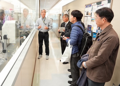 JOINT BASE SAN ANTONIO-FORT SAM HOUSTON – (Jan. 13, 2026) – Dr. Yoon Hwang, a research scientist assigned to Naval Medical Research Unit (NAMRU) San Antonio’s Environmental Surveillance Department, gives a tour of research facilities at the Battlefield Health and Trauma Research Institute to representatives of Japan’s National Defense Medical College’s (NDMC).  The visit, led by Dr. Manabu Kinoshita, NDMC’s chairman professor, Department of Immunology and Microbiology, continues a sustained partnership between NAMRU San Antonio and NDMC to enhance each other’s capabilities to counteract emerging threats, benefiting military health as well as global health security. Navy Medicine Research & Development (NMR&D) contributes directly to positive working relationships with partner nation militaries, keeping the scope of Department of War capabilities wide, and at the ready, to address emerging threats aboard. NAMRU San Antonio, part of NMR&D, conducts gap-driven combat casualty care, craniofacial, and directed energy research in support of Navy, Marine Corps and joint U.S. warfighter health readiness and lethality while engaged in routine and expeditionary operations. (U.S. Navy photo by Burrell Parmer, NAMRU San Antonio Public Affairs/Released)