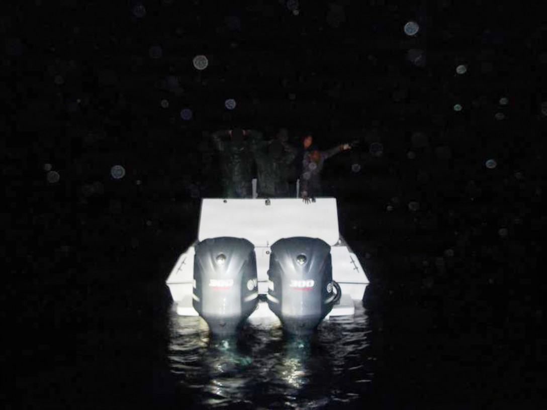 A Coast Guard Cutter Alert (WMEC 630) small boat crew interdicts a go-fast style vessel trafficking illegal narcotics in the Windward Passage, Dec. 6, 2025. Alert's crew seized 2,250 pounds of cocaine valued at $18.4 million, seven pounds of marijuana valued at $7,000 and an illegal firearm, later transferring the narcotics, firearm and four suspected drug smugglers aboard to the Bahamas government for prosecution. (U.S. Coast Guard photo)