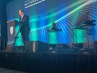 Secretary of the Navy John Phelan speaks at the Surface Navy Association National Symposium Jan. 13, 2026, in Arlington, Va.