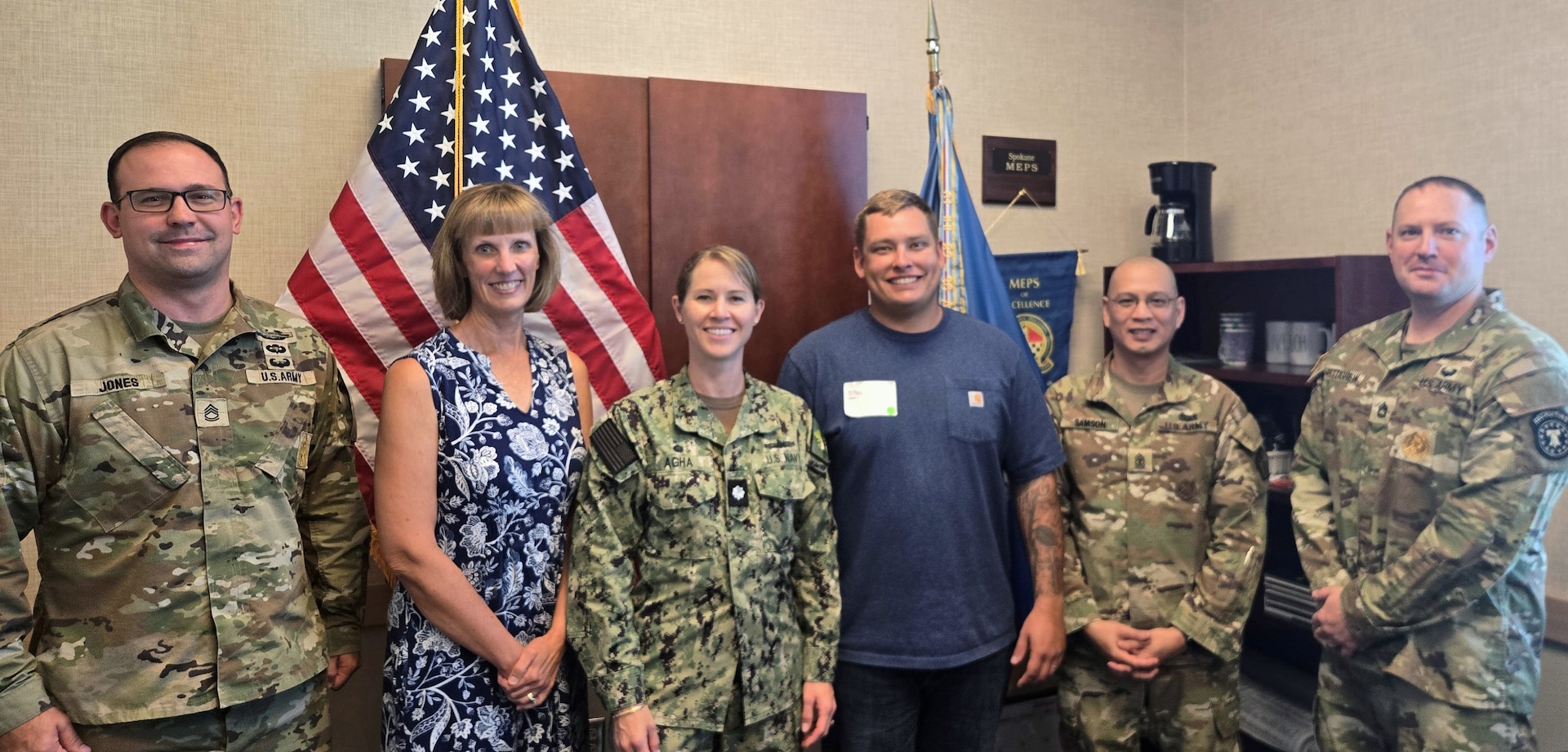 Spokane MEPS Army service liaison Sgt. 1st Class Brandon Jones, Spokane MEPS chief medical officer Dr. Victoria Weaver, Spokane MEPS commander Navy Cmdr. Kelly Agha, Immersive Recruiter Experience "applicant" Army Sgt. 1st Class Derek Dittmer, Spokane MEPS senior enlisted advisor Army 1st Sgt. Vincente Samson and Spokane MEPS Army service liaison Sgt. 1st Class Gordon Pettigrew pose for a photo. Spokane MEPS' Immersive Recruiter Experience allows recruiters to process as applicants, strengthening recruiter-MEPS partnerships and reinforcing their shared mission.