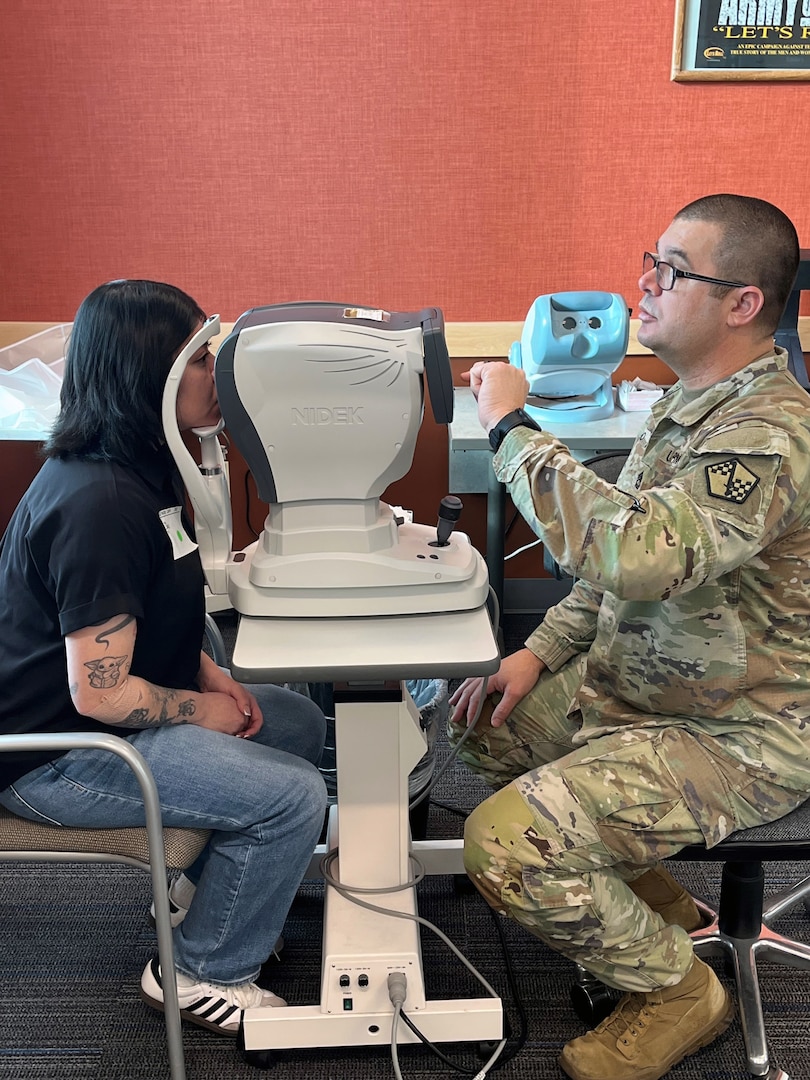 Army Sgt. 1st Class Timothy Patino, Spokane MEPS medical NCOIC, conducts vision tests on Marine Corps recruiter Staff Sgt. Liseth Salinas as part of the Spokane MEPS Immersive Recruiter Experience. Spokane MEPS' Immersive Recruiter Experience allows recruiters to process as applicants, strengthening recruiter-MEPS partnerships and reinforcing their shared mission.