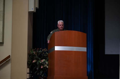 a person speaks to an audience