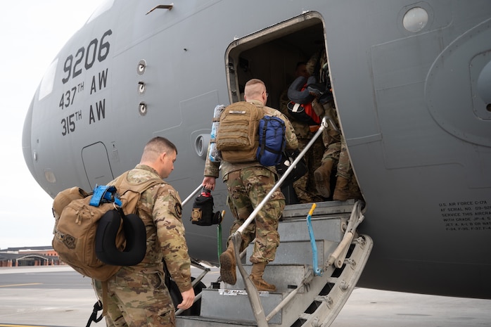 U.S. Air Force Airmen board a C17 Globemaster III.