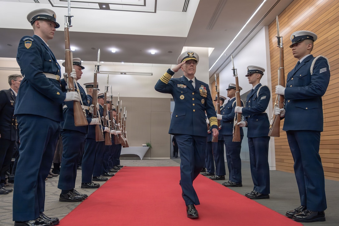 U.S. Coast Guard Adm. Kevin E. Lunday salutes the Coast Guard Honor Guard before his assumption of command ceremony at Coast Guard Headquarters in Washington, D.C., on Jan. 15, 2026. Lunday takes command as the Coast Guard evolves under Force Design 2028, an effort to transform and ensure mission success through three strategic outcomes: border control, the flow of commerce and responding to contingencies.