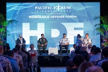 Adm. Samuel J. Paparo, right, commander of U.S. Indo-Pacific Command, participates in a panel discussion at the Honolulu Defense Forum in Honolulu, Jan. 13, 2026.