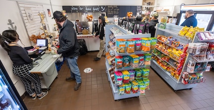 Command employees place their sandwich orders at the new Anchors Aweigh location inside Building 850A at Puget Sound Naval Shipyard & Intermediate Maintenance Facility in Bremerton Washington, Nov. 13, 2025. The Kitsap County-based company opened two locations at PSNS & IMF late last year. (U.S. Navy photos by Wendy Hallmark)