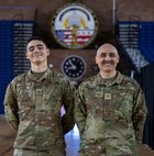 U.S Army Maj. Roy Baker, right, 45th Field Artillery, and Pfc. Radomir Baker, 2-245th Headquarters and Headquarters Company, pose for a photo in the District of Columbia Armory in Washington, D.C. Jan. 13, 2026. About 2,500 National Guard members are supporting the D.C. Safe and Beautiful mission providing critical support to the D.C. Metropolitan Police Department in ensuring the safety of all who live, work and visit the District. (U.S. Army National Guard Photo by Spc. Paris Hayes)