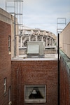 The partially-demolished edifice of Robert F. Kennedy Memorial Stadium is visible from the roof of the DC Armory in Washington, D.C., Aug. 18, 2025. The longstanding landmark fell into disrepair and is being demolished to make way for a new stadium. (U.S. Air National Guard photo by Tech. Sgt. Andrew Enriquez)