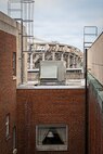The partially-demolished edifice of Robert F. Kennedy Memorial Stadium is visible from the roof of the DC Armory in Washington, D.C., Aug. 18, 2025. The longstanding landmark fell into disrepair and is being demolished to make way for a new stadium. (U.S. Air National Guard photo by Tech. Sgt. Andrew Enriquez)