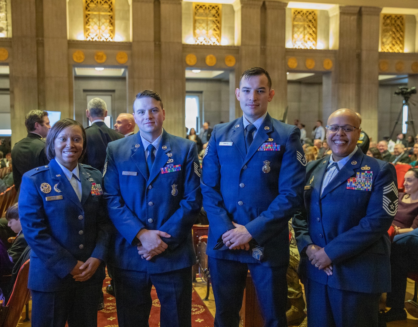 U.S. Air Force Tech. Sgt. Dylan Chadbourne, second from left, and Staff Sgt. Hector Amaya, second from right, assigned to the 113th Security Forces Squadron, Joint Task Force – District of Columbia, received awards during a Winter Ceremony held by the U.S. Park Police in Washington, D.C. Jan. 9, 2026. About 2,500 National Guard members are supporting the D.C. Safe and Beautiful mission providing critical support to the D.C. Metropolitan Police Department in ensuring the safety of all who live, work and visit the District. (U.S. Army National Guard Photo by Spc. Paris Hayes)