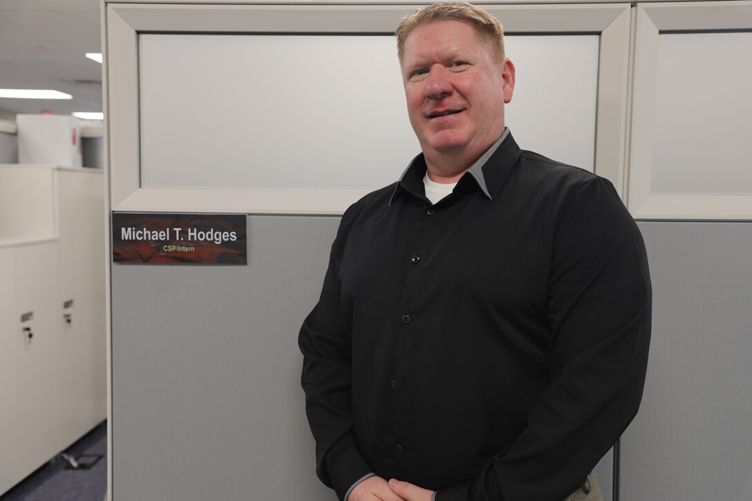 Sgt. 1st Class Michael T. Hodges, a SkillBridge intern at the U.S. Army Corps of Engineers – Far East District (USACE FED) in the Resource Management Office, poses for a photo at his workstation area while supporting FED’s financial and business operations during his internship on January 9, 2026, at Camp Humphreys, South Korea. Hodges said he chose USACE FED because the organization offers a unique opportunity to apply his background in business, logistics and leadership within a mission driven, team oriented environment. (U.S. Army photo by Yohan An)