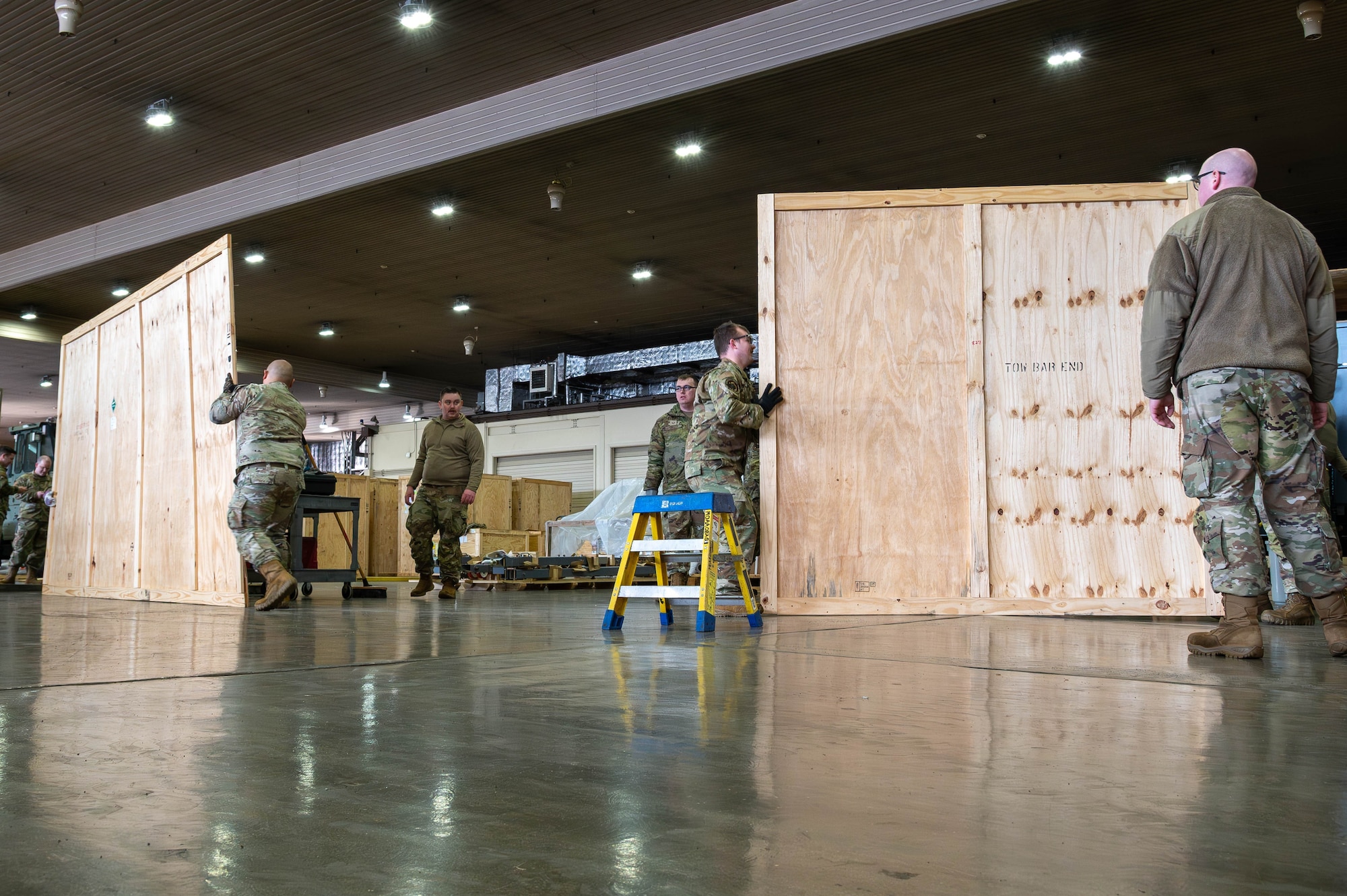 U.S. Airmen assigned to the 35th Fighter Wing discard F-35A Lightning II support equipment crate parts at Misawa Air Base, Japan, Jan. 13, 2026.
