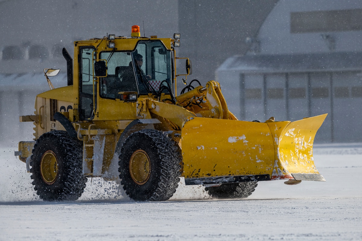 A snow plow removes snow on the flightline at Misawa Air Base, Japan, Jan. 14, 2026.