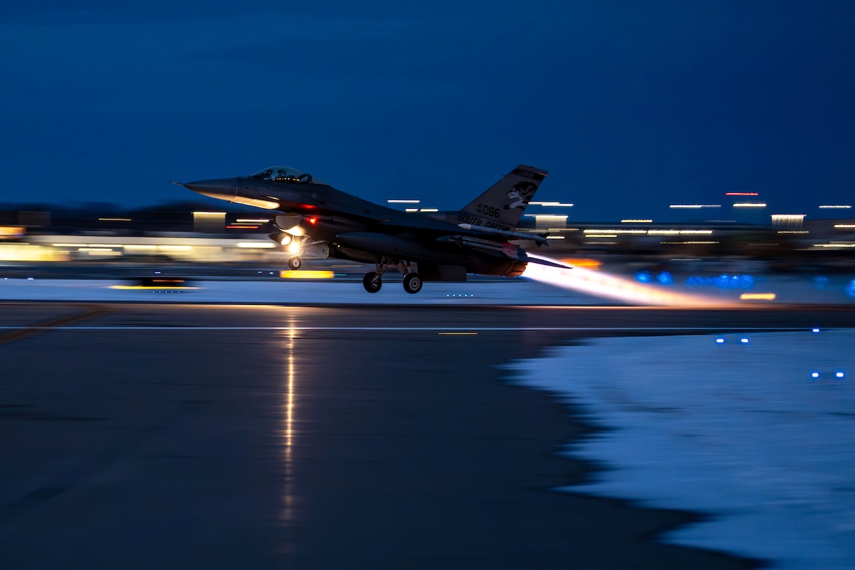 An F-16 Fighting Falcon from the 175th Fighter Squadron, South Dakota Air National Guard, takes off from Joe Foss Field, S.D., Dec. 16, 2025, during night flying operations. Night training prepares aircrews to operate in various visibility and weather conditions. (U.S. Air National Guard photo by Master Sgt. Luke Olson)