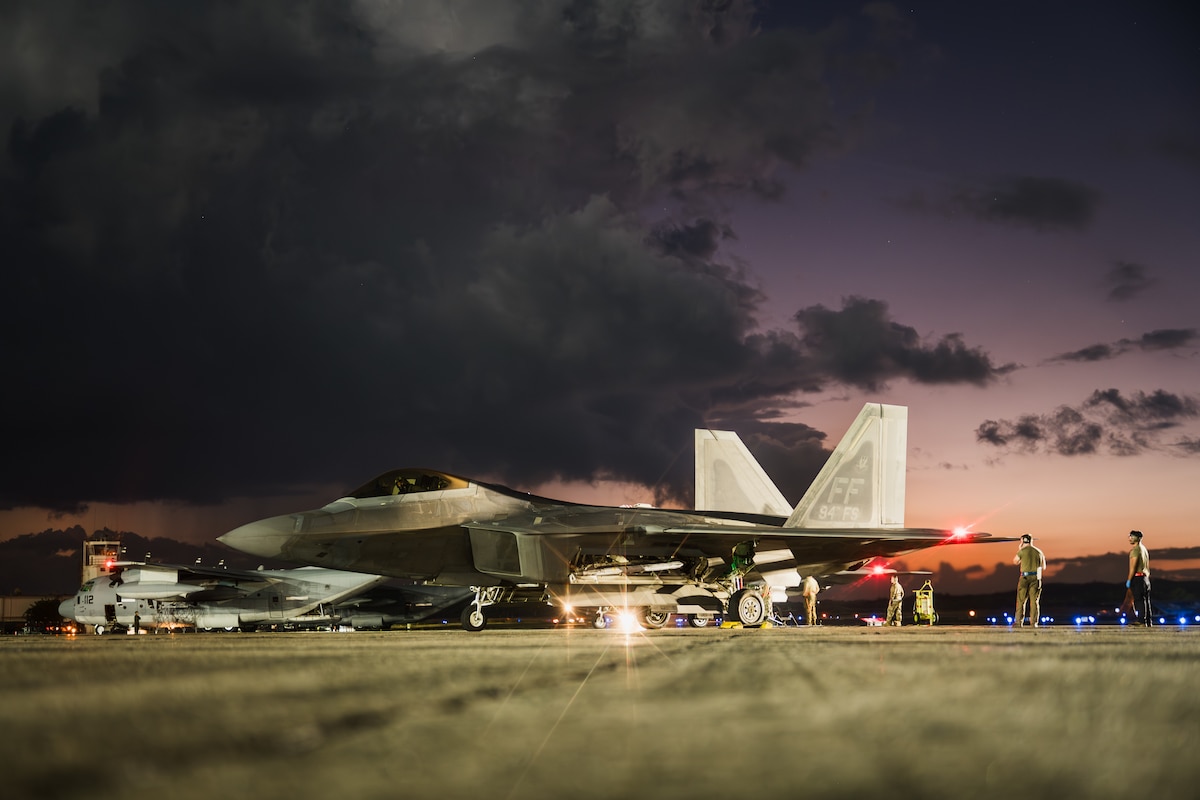 Airmen perform essential checks on an F-22 Raptor following military actions in Venezuela in support of Operation Absolute Resolve in Ceiba, Puerto Rico, Jan. 3, 2026. As part of the larger U.S. military operation that included airstrikes and the capture of Venezuelan President Nicolás Maduro, F-22s were temporarily deployed to support air operations and maintain air superiority in the region. (U.S. Air Force photo by Senior Airman Katelynn Jackson)