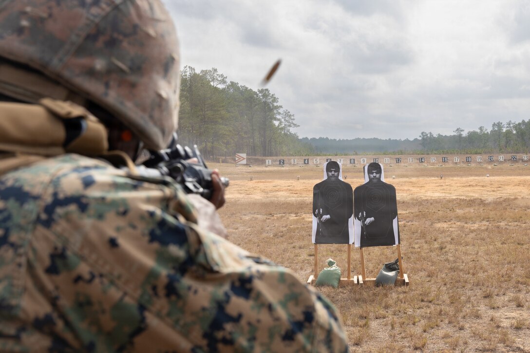 A U.S. Marine with Truck Company, 23rd Marine Regiment, 4th Marine Division, fires a rifle during annual training at Fort Polk, Louisiana, Jan. 9, 2026. The known distance range enhances marksmanship fundamentals and combat readiness. (U.S. Marine Corps photo by Lance Cpl. Claire Cheney)