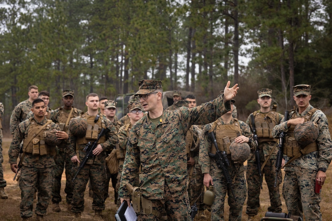 U.S. Marine Corps Staff Sgt. Carmen M. Hernandez, a motor vehicle operator with Truck Company, 23rd Marine Regiment, 4th Marine Division, gives a range safety brief during annual training at Fort Polk, Louisiana, Jan. 9, 2026. Marines conducted a known distance range to enhance marksmanship fundamentals and combat readiness. (U.S. Marine Corps photo by Lance Cpl. Claire Cheney)