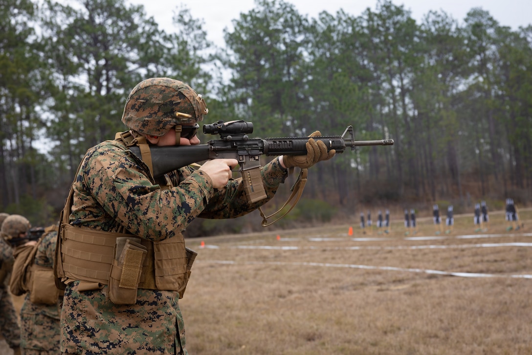 U.S. Marine Corps Lance Cpl. James F. Beatty III, a moto vehicle operator with Truck Company, 23rd Marine Regiment, 4th Marine Division, fires an M16A4 rifle during annual training at Fort Polk, Louisiana, Jan. 9, 2026. Marines conducted a known distance range to enhance marksmanship fundamentals and combat readiness. (U.S. Marine Corps photo by Lance Cpl. Claire Cheney)