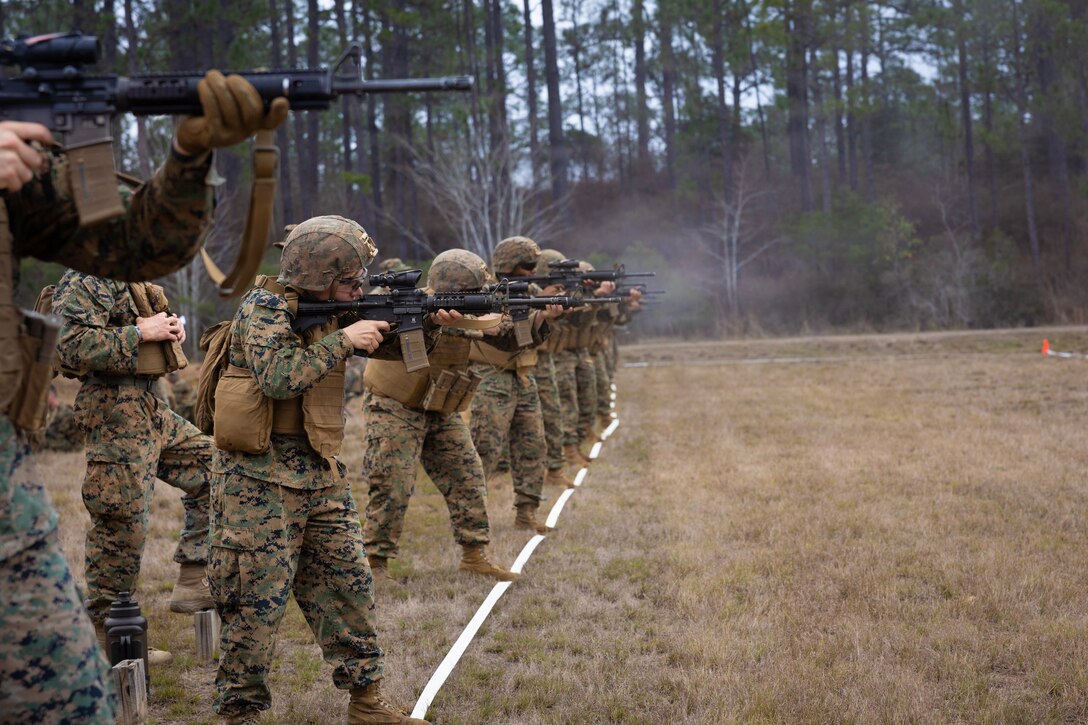 U.S. Marines with Truck Company, 23rd Marine Regiment, 4th Marine Division, fire rifles during annual training at Fort Polk, Louisiana, Jan. 9, 2026. The known distance range enhances marksmanship fundamentals and combat readiness. (U.S. Marine Corps photo by Lance Cpl. Claire Cheney)