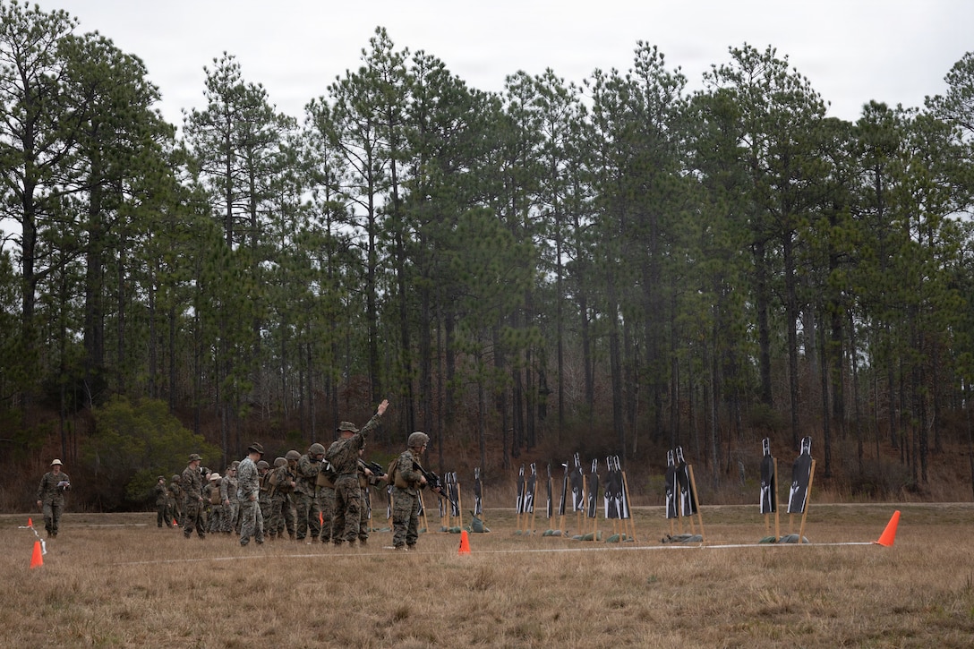 U.S. Marines with Truck Company, 23rd Marine Regiment, 4th Marine Division, participate in a live fire range at Fort Polk, Louisiana, Jan. 9, 2026. The known distance range enhances marksmanship fundamentals and combat readiness. (U.S. Marine Corps photo by Lance Cpl. Claire Cheney)