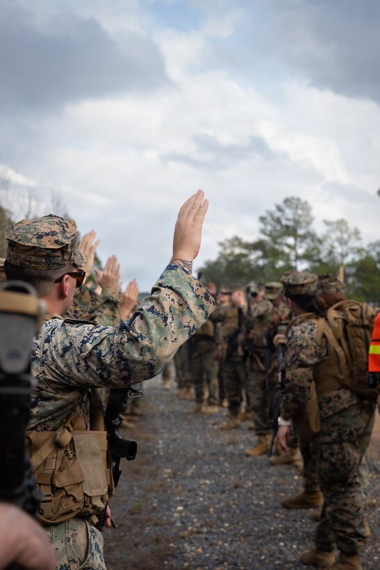 U.S. Marines with Truck Company, 23rd Marine Regiment, 4th Marine Division, take accountability, Fort Polk, Louisiana, Jan. 9, 2026. Marines with Truck company departed a known distance range, which enhanced marksmanship fundamentals and combat readiness. (U.S. Marine Corps photo by Lance Cpl. Claire Cheney)