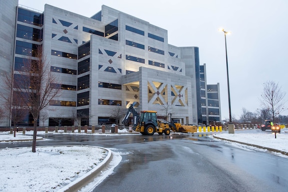 Building with snow plows in front