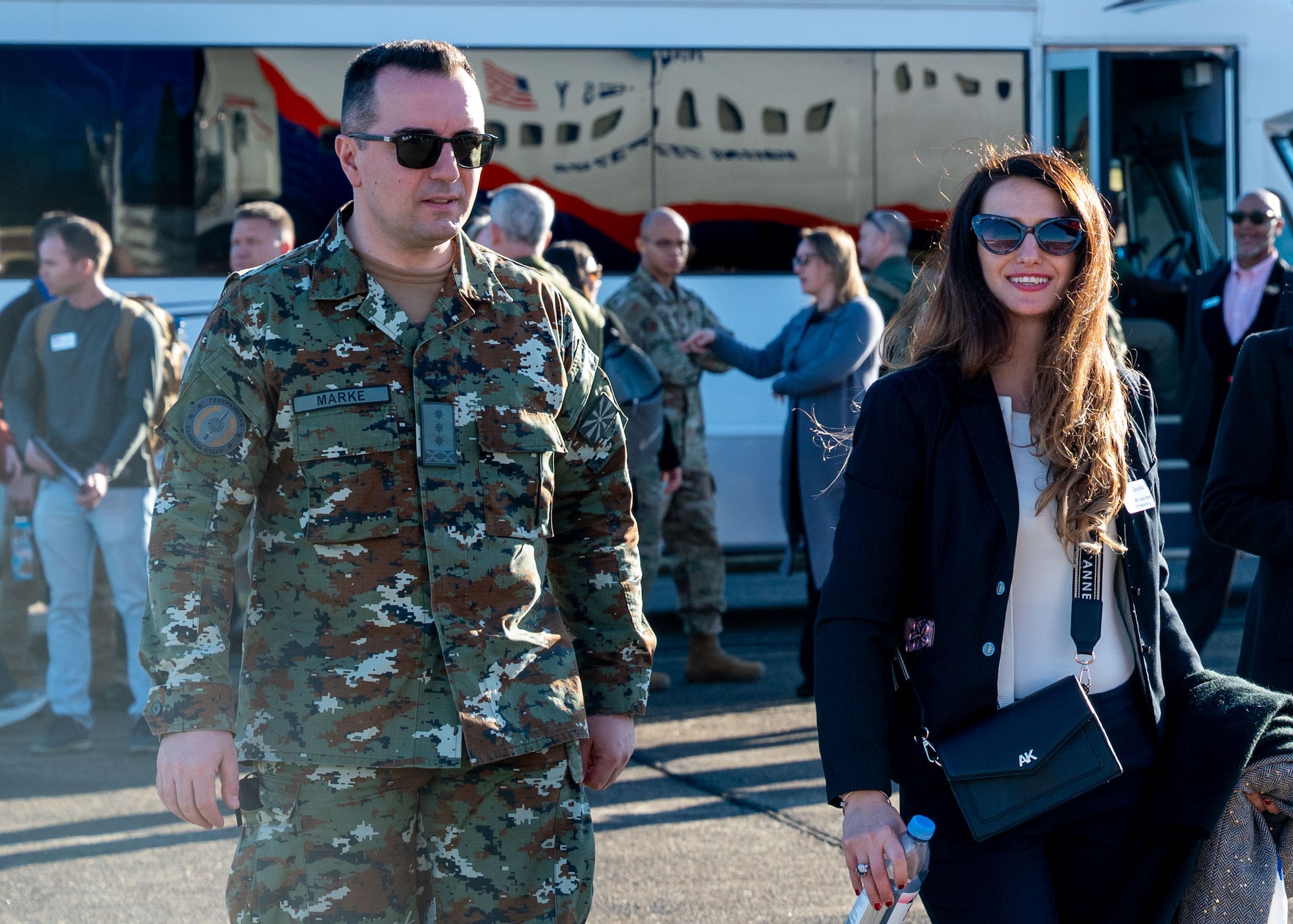 North Macedonian Air Brigade Col. Jetnor Marke, Air and Space Attaché, and his spouse, Saranda Kaba Marke, walk on the flight line during an International Air and Space Attachés orientation tour at Maxwell Air Force Base, Jan. 13, 2026.