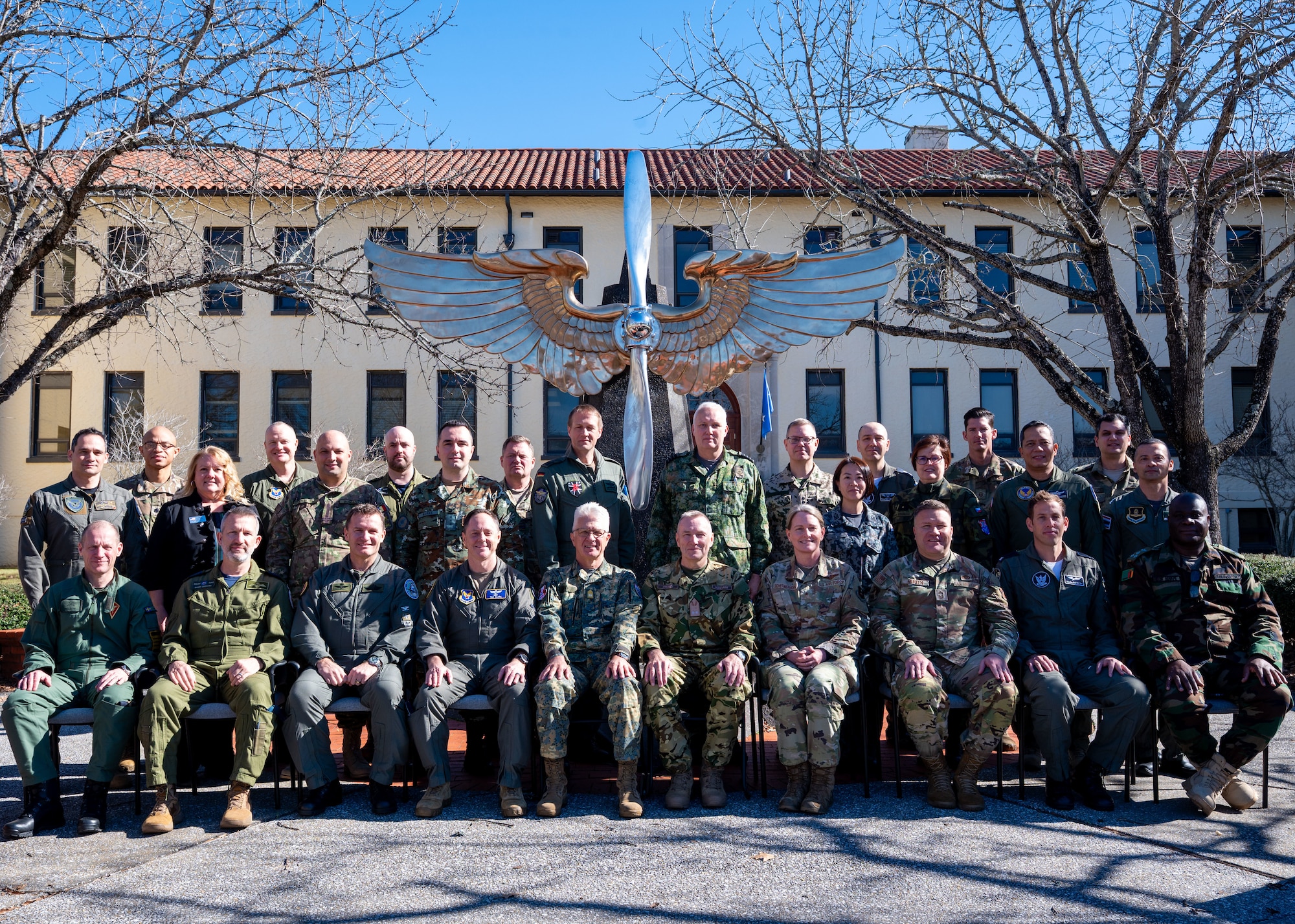 International Air and Space Attachés pose for a group photo during an orientation tour at Maxwell Air Force Base, Alabama Jan. 13, 2026.