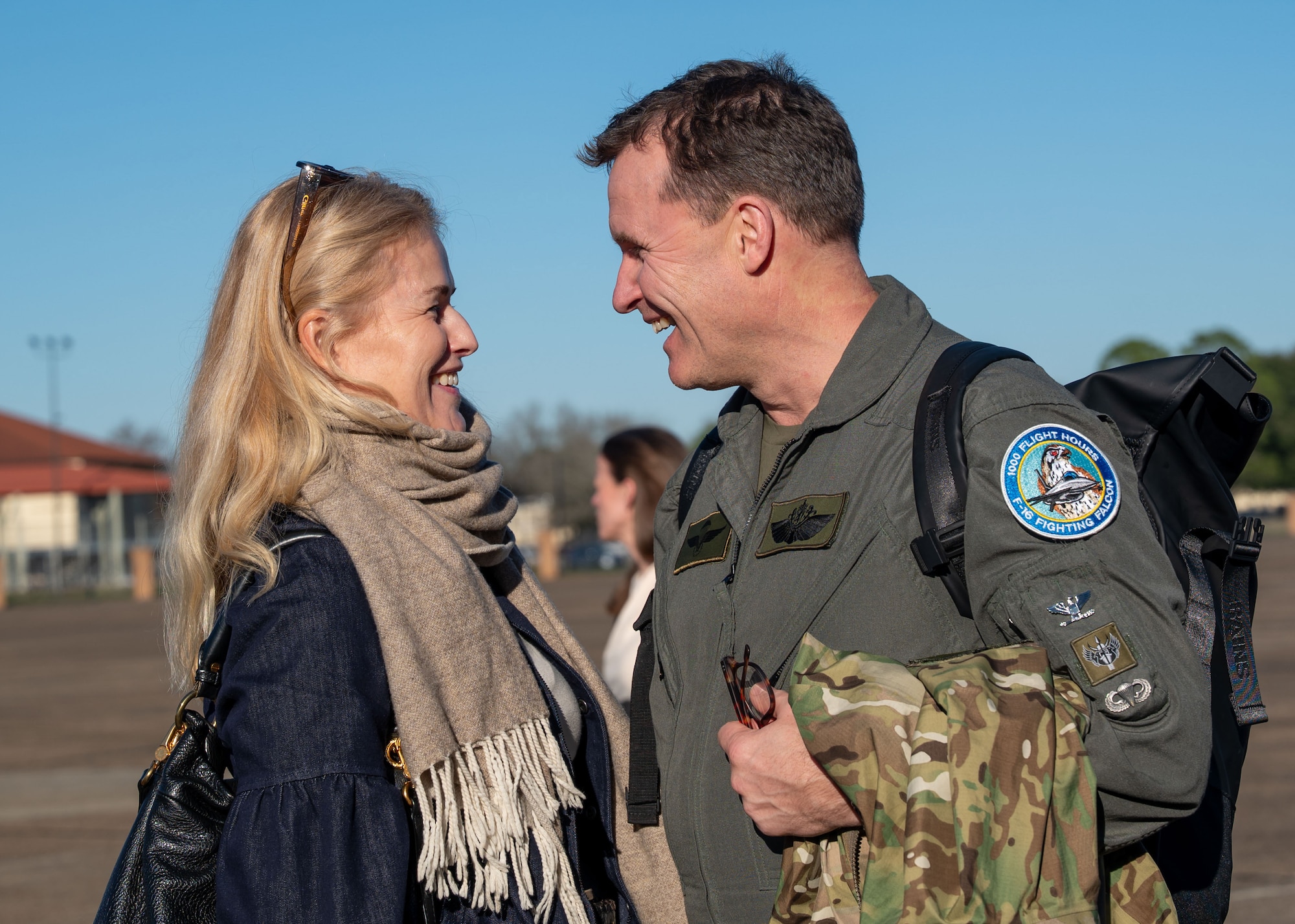 Royal Norwegian Air Force Col. Nico Christiansen, Air and Space Attaché, and his spouse, Hilde Nilsen, share a moment on the flight line during an International Air and Space Attachés orientation tour at Maxwell Air Force Base, Alabama, Jan. 13, 2026.