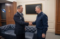 Chairman of the Joint Chiefs of Staff Gen. Dan Caine meets with Chief of Staff of the Japan Joint Staff Gen. Uchikura Hiroaki at the Pentagon in Washington, D.C., January 16, 2026.
