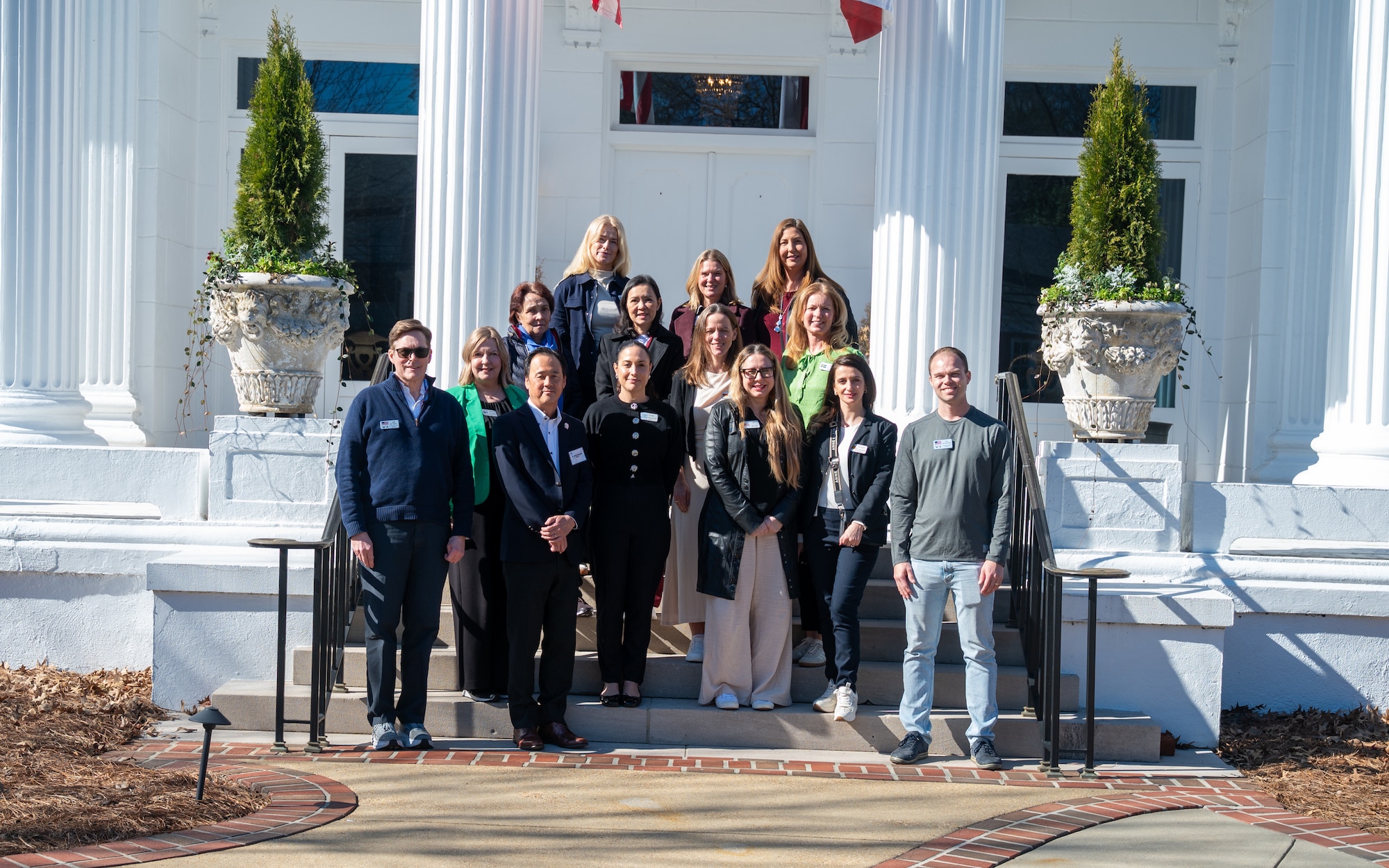 International Air and Space Attaché spouses pose for a group photo outside the Governor’s Mansion in Montgomery, Alabama, Jan. 13, 2026.