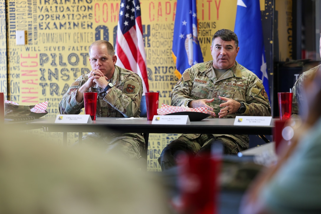 U.S. Air Force Maj. Gen. Wolfe Davidson, Second Air Force commander, and U.S. Air Force Chief Master Sgt. Colin Fleck, Second Air Force command chief, converse with instructors and military training leaders during a lunch gathering at Sheppard Air Force Base, Texas, Jan. 15, 2026.