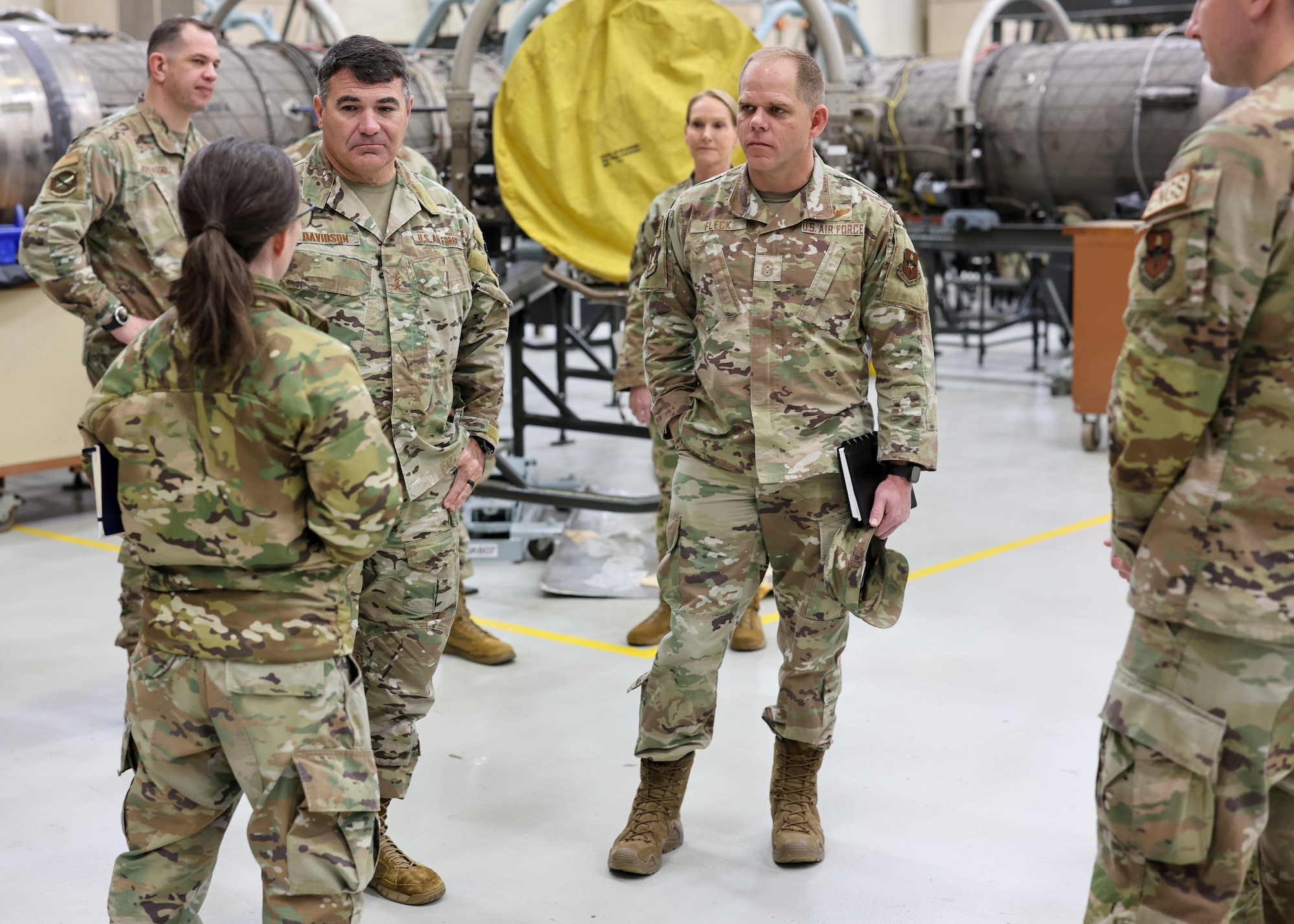 U.S. Air Force Maj. Gen. Wolfe Davidson, Second Air Force commander, and U.S. Air Force Chief Master Sgt. Colin Fleck, Second Air Force command chief, gain insight into squadron operations from U.S. Air Force Maj. Alexandra Gegen, 361st Training Squadron commander, in the 361st TRS Propulsion building at Sheppard Air Force Base, Texas, Jan. 15, 2026.