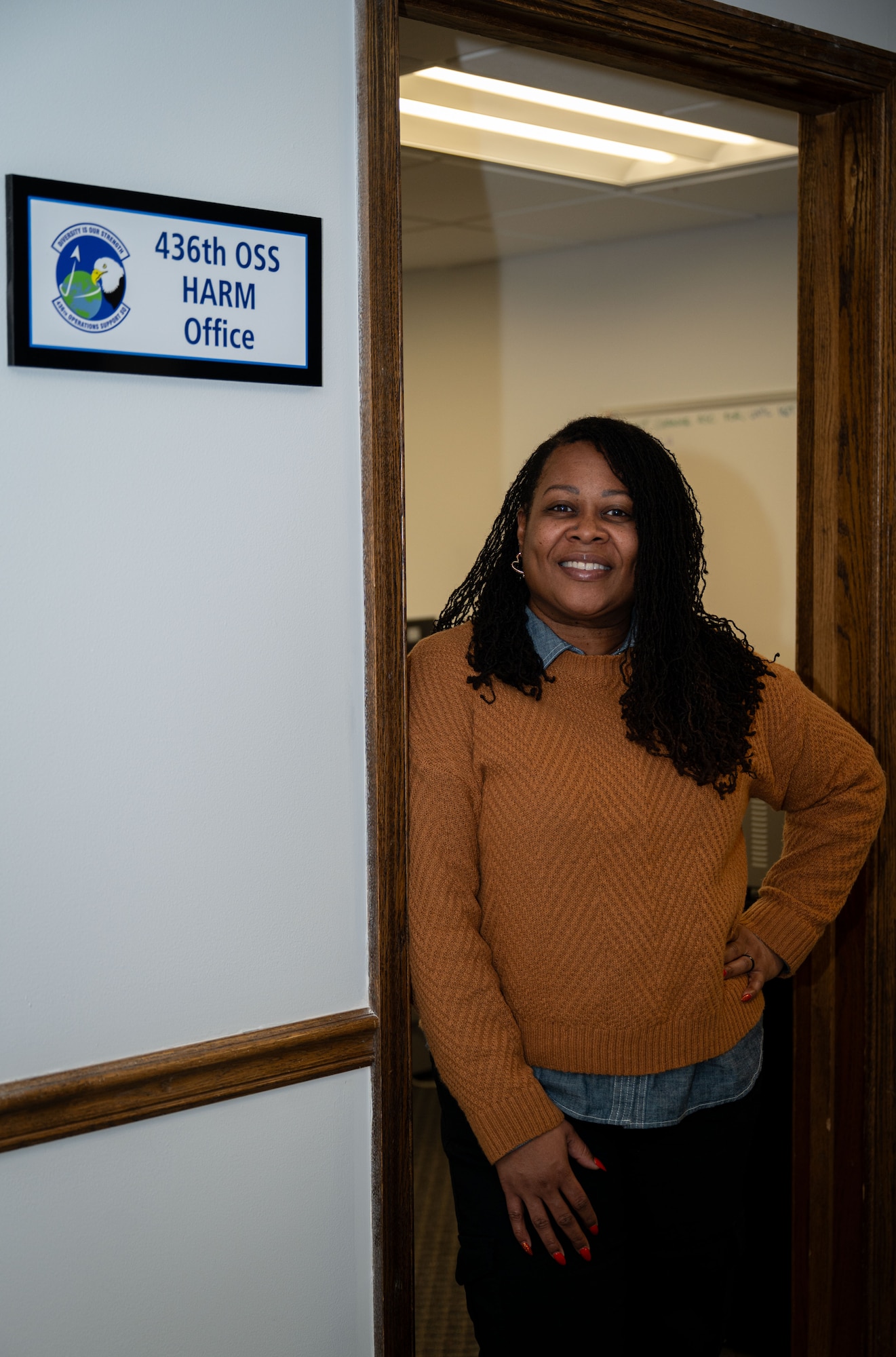 Kimeka Downey, 436th Operations Support Squadron host aviation resources support assistant chief, poses for a photo at Dover Air Force Base, Delaware, Jan. 14, 2026. As a HARM, she oversees four squadrons and is responsible for managing flight pay, duty titles, flight physicals and aviation service codes. (U.S. Air Force photo by Airman 1st Class Liberty Kuhn)