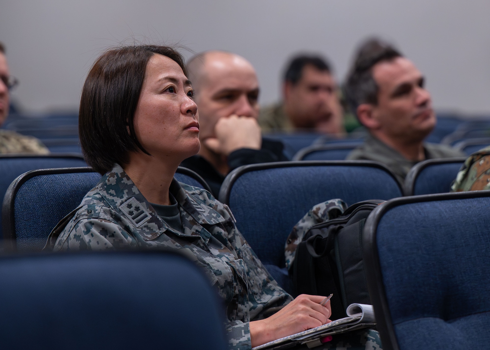 Japan Air Self-Defense Force Col. Yuka Nakazato, Air and Space Attaché, attends a panel briefing during an orientation tour at Maxwell Air Force Base, Alabama Jan. 13, 2026.