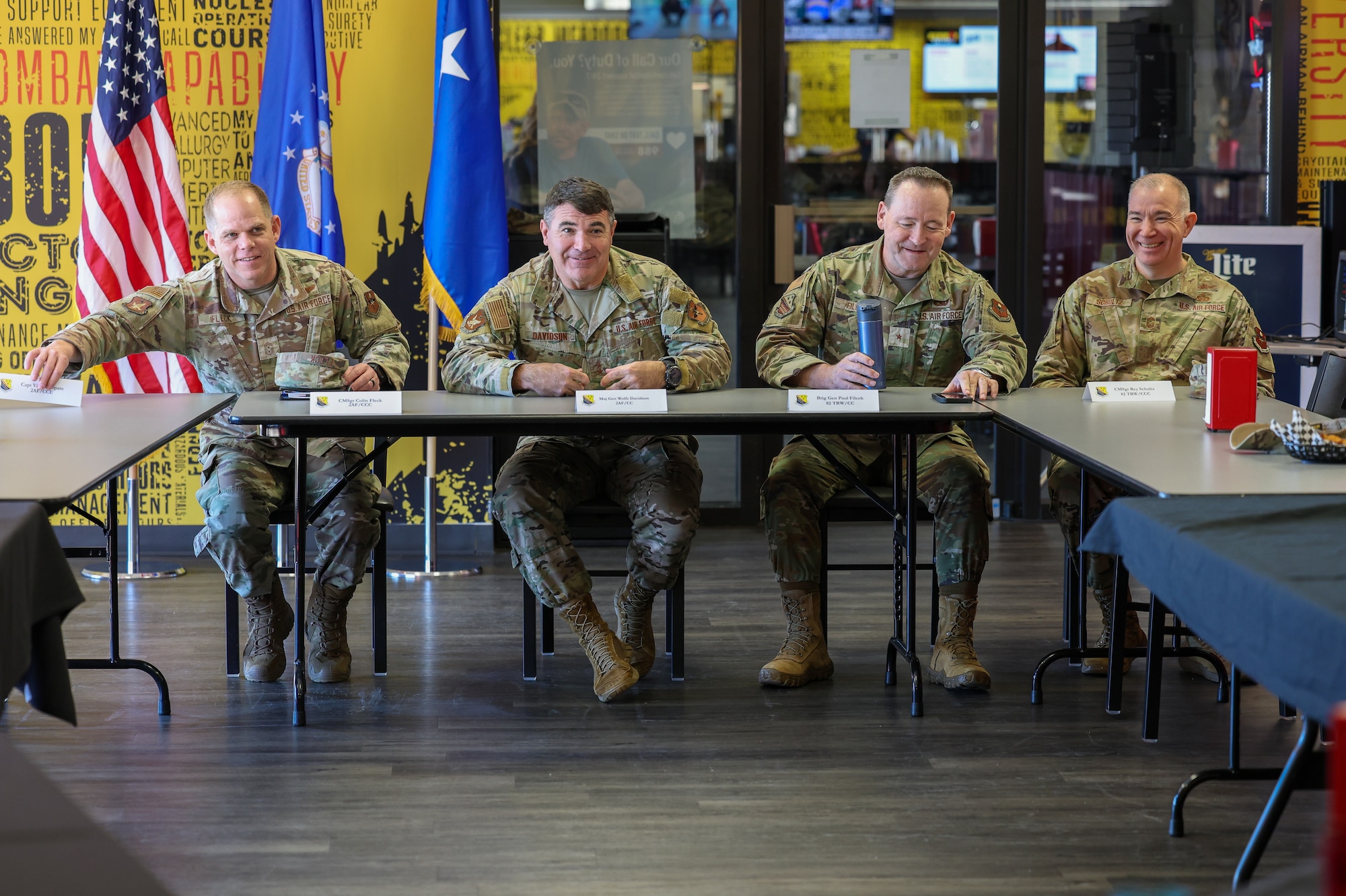 From left, U.S. Air Force Chief Master Sgt. Colin Fleck, Second Air Force command chief; U.S. Air Force Maj. Gen. Wolfe Davidson, Second Air Force commander; U.S. Air Force Brig. Gen. Paul Filcek, 82nd Training Wing commander; and U.S. Air Force Chief Master Sgt. Rey Schultz, 82nd TRW command chief, sit together during a lunch with instructors and military training leaders at Sheppard Air Force Base, Texas, Jan. 15, 2026.