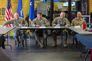 From left, U.S. Air Force Chief Master Sgt. Colin Fleck, Second Air Force command chief; U.S. Air Force Maj. Gen. Wolfe Davidson, Second Air Force commander; U.S. Air Force Brig. Gen. Paul Filcek, 82nd Training Wing commander; and U.S. Air Force Chief Master Sgt. Rey Schultz, 82nd TRW command chief, sit together during a lunch with instructors and military training leaders at Sheppard Air Force Base, Texas, Jan. 15, 2026.