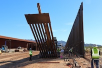 The U.S. Army Corps of Engineers contractors install border panels at the east end of the BMGR-1 project site near Yuma, Arizona, Jan 14. USACE is replacing permanent border barriers along the southern border of the U.S. at the direction of the U.S. Army by the Secretary of War, in response to the presidential national emergency declaration dated Jan. 20, 2025, authorizing the use of Section 2803 of Title 10, U.S. Code. (No one in this image crossed the international border)