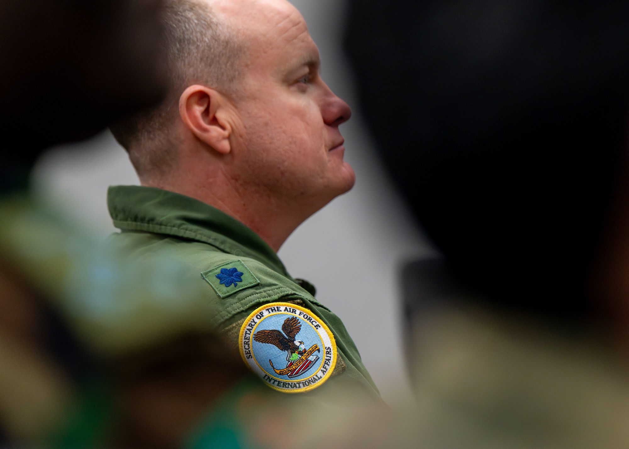 U.S. Air Force Lt. Col. Robert Faith, Secretary of the Air Force International Affairs attaché engagements, attends a panel briefing during an orientation tour at Maxwell Air Force Base, Alabama Jan. 13, 2026.