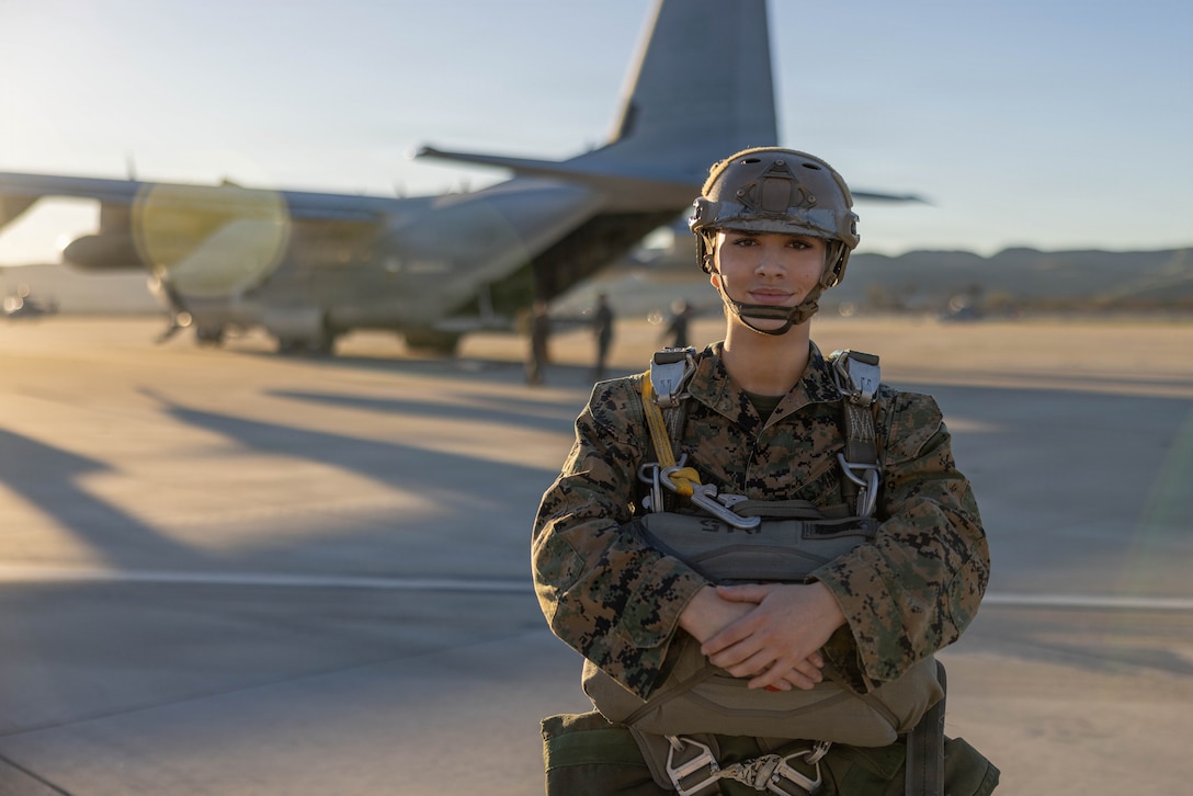 U.S. Marine Corps Pfc. Iliriana Baftiu, an air delivery specialist with 1st Distribution Support Battalion, Combat Logistics Regiment 1, 1st Marine Logistics Group, poses for a photo before conducting air delivery operations on Marine Corps Base Camp Pendleton, California, Jan. 13, 2026.