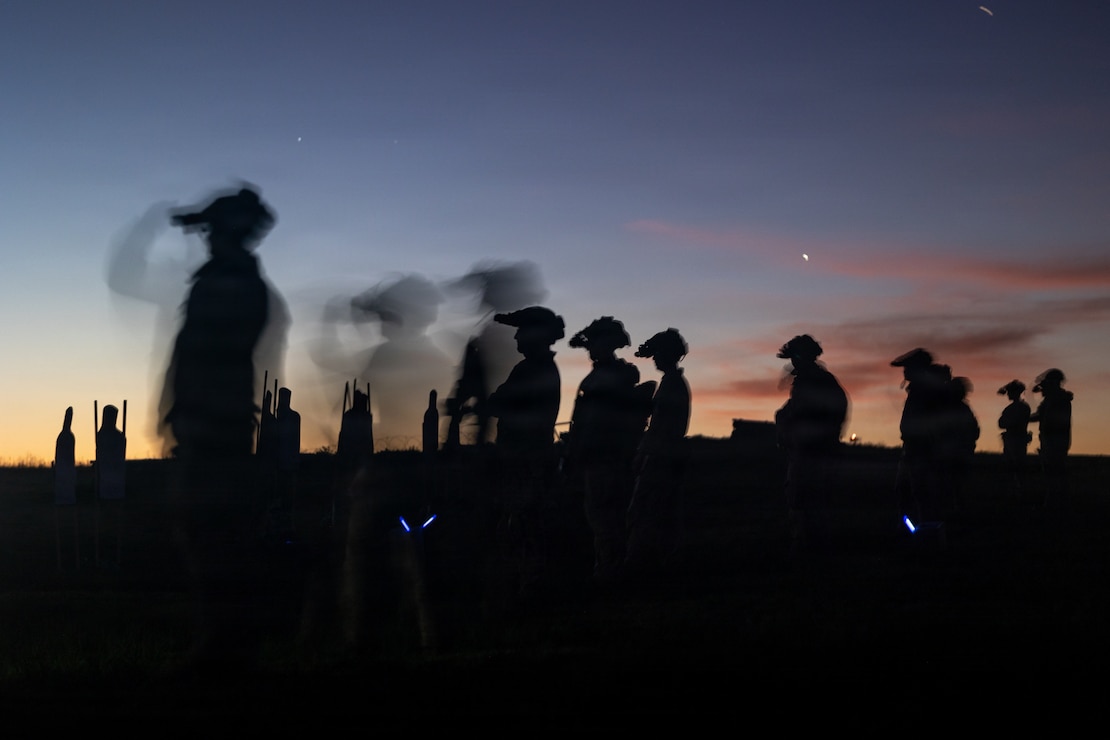 U.S. Marines with the Maritime Raid Force, 11th Marine Expeditionary Unit, prepare to conduct low light shoot and move drills during a live-fire range at Marine Corps Base Camp Pendleton, California, Jan. 13, 2026.