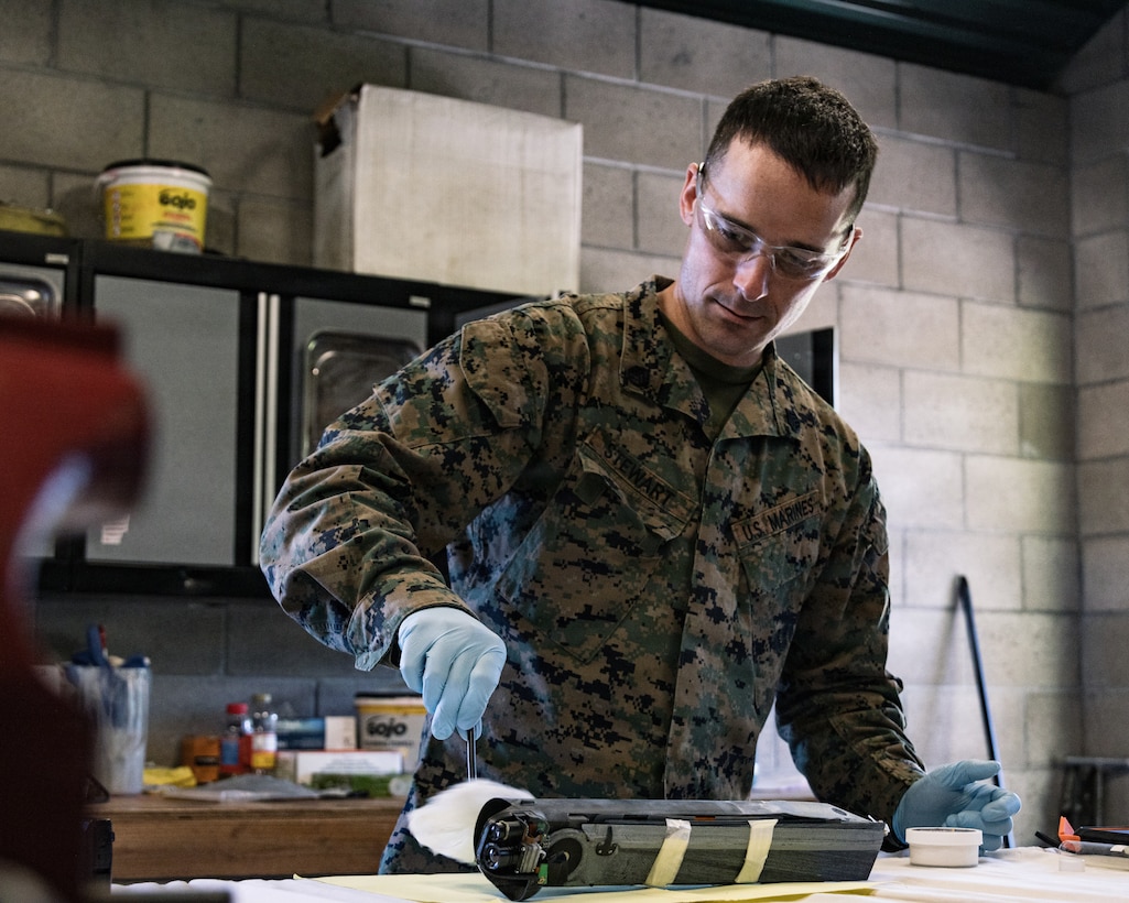 U.S. Marine Corps Staff Sgt. Brian Stewart, an identity and attribution activities examiner with the 11th Marine Expeditionary Unit, I Marine Expeditionary Force, examines ordnance during explosive ordnance disposal unit level training on Marine Corps Base Camp Pendleton, California, Jan. 14, 2026.