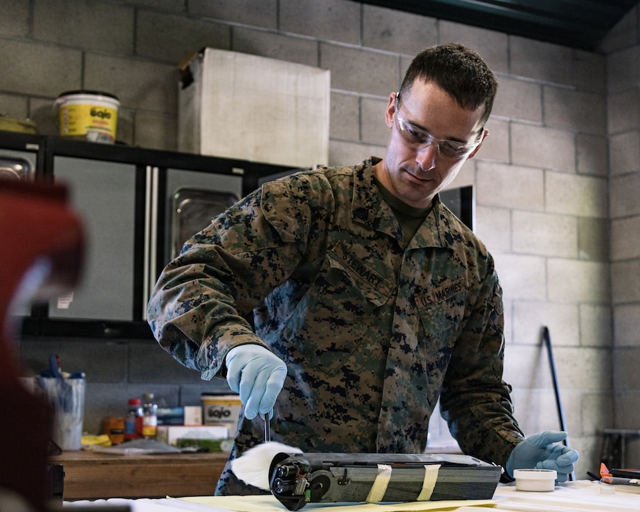 U.S. Marine Corps Staff Sgt. Brian Stewart, an identity and attribution activities examiner with the 11th Marine Expeditionary Unit, I Marine Expeditionary Force, examines ordnance during explosive ordnance disposal unit level training on Marine Corps Base Camp Pendleton, California, Jan. 14, 2026.