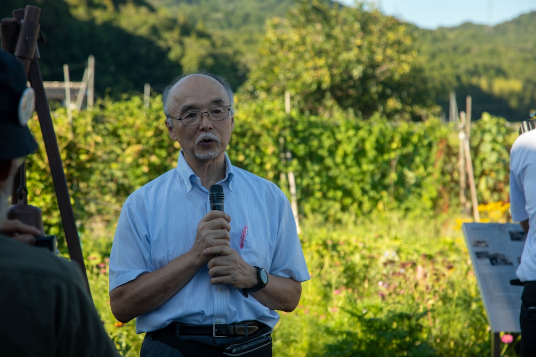 Japanese historian Mr.Yozo Kudo speaks to the attendees of a memorial event in Yanai, Japan, July 28, 2025. Local residents came together to support the memorial in Yanai, Japan, paying tribute to American and Japanese lives lost during World War II. (U.S. Marine Corps photo by Lance Cpl. Micah Taylor)